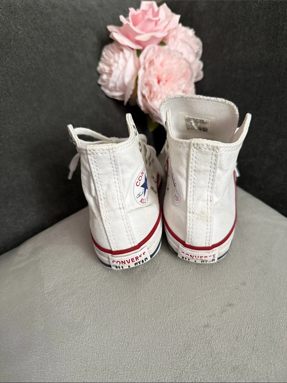 Converse White High-Top Sneakers with Red Trim and Blue Star